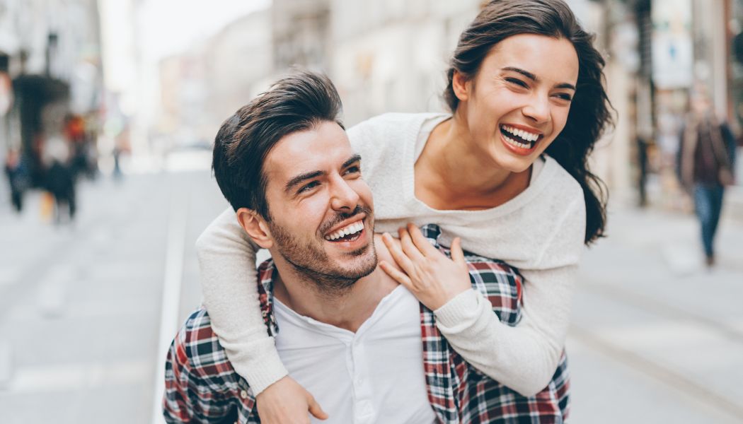 Happy couple smiling — trusted dentist in Surrey Quays